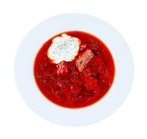 Borsch traditionele Russische soep. uitzicht vanaf de top. geïsoleerd op witte achtergrond. — Stockfoto