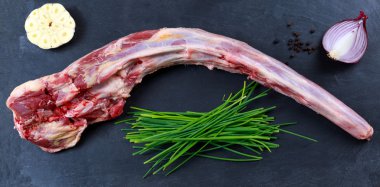 Fresh Raw Beef Oxtail Meat ready to cook. on Blue stone  Background.