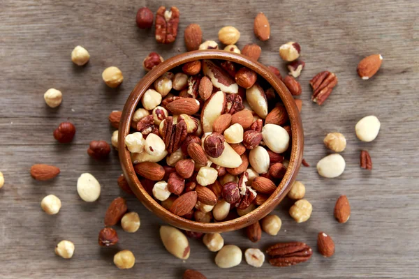 Mix nuts in wooden bowls — Stock Photo, Image