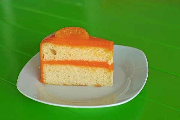 Orange cake on white plate — Stock Photo, Image