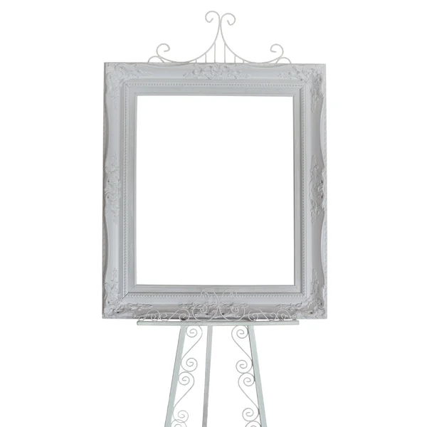 Antique white picture frames on stand photo — Stock Photo, Image