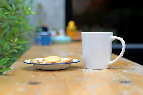 Hot coffee with biscuit and cookie — Stock Photo, Image