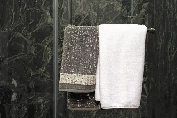 Towels on door handle of shower room — Stock Photo, Image