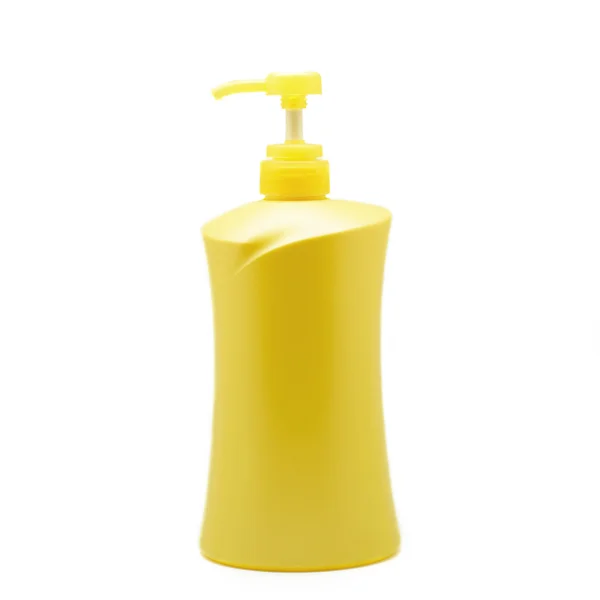 Garrafa de bomba de plástico amarelo — Fotografia de Stock