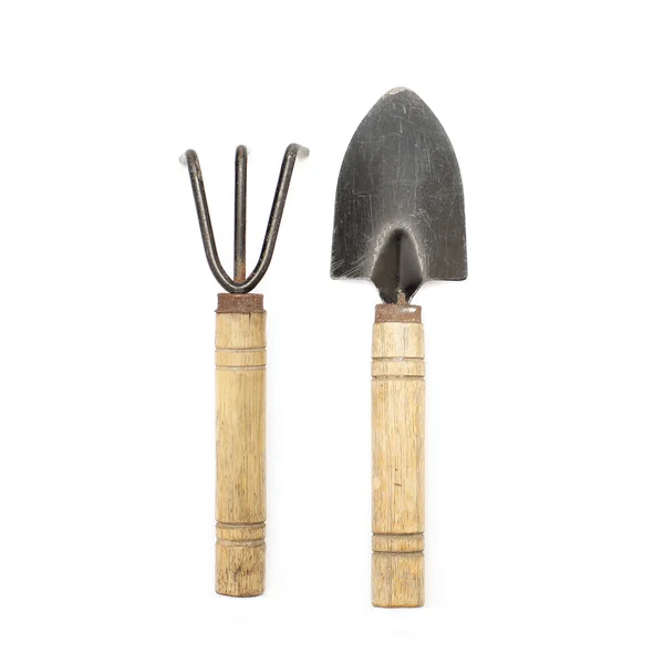 Old gardening tools spade and rake — Stock Photo, Image