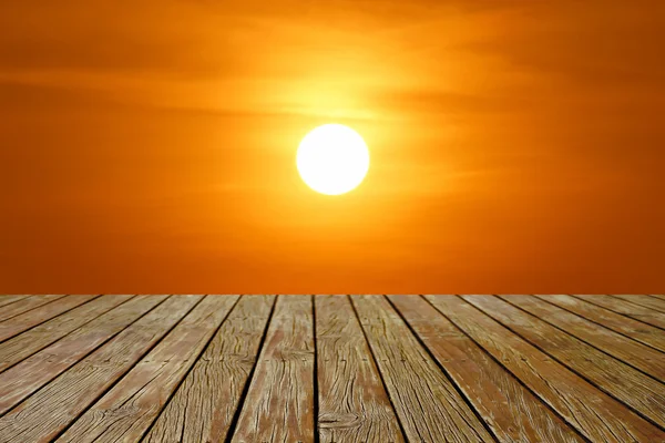Houten vloer met prachtige zonsondergang — Stockfoto
