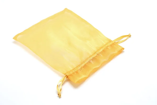 Pequena bolsa de tecido no fundo branco — Fotografia de Stock