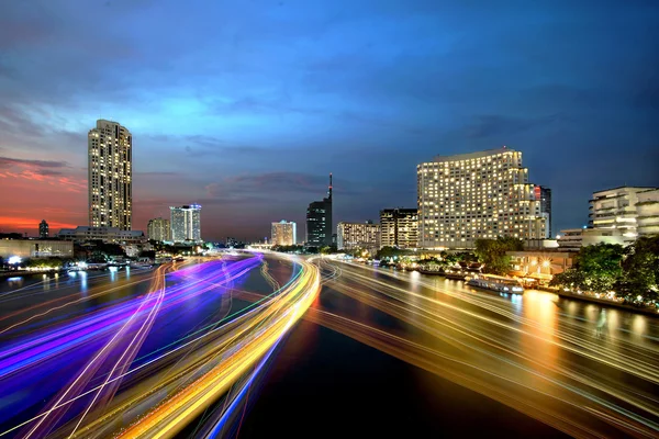 Boat light trails on the river — Stock Photo, Image