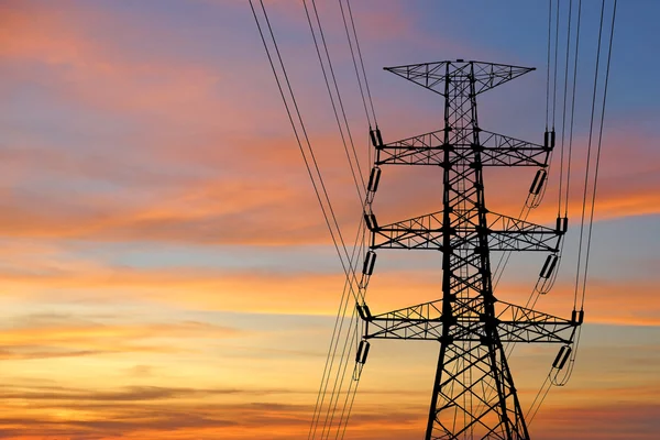 Silhouette of high voltage electric tower — Stock Photo, Image