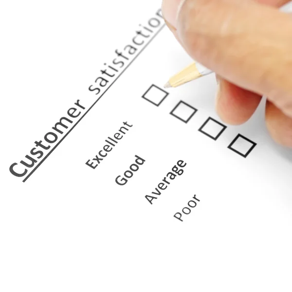 Umfrageformular zur Kundenzufriedenheit mit dem Stift geprüft ausgezeichnet — Stockfoto