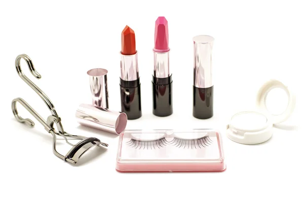 Make-up set met lippenstift valse wimpers wimper krultang en eyesha — Stockfoto