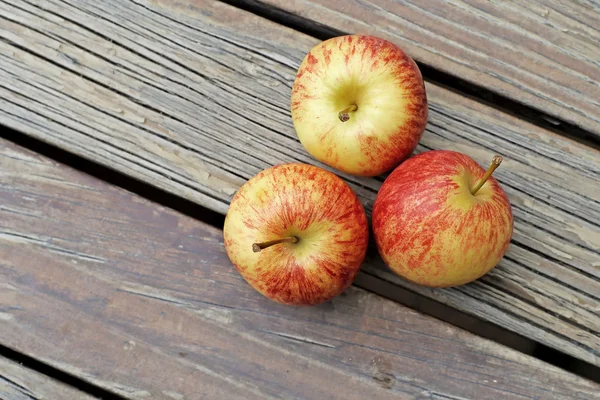 sweet apple fruit on wooden floor