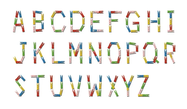 Alfabetu angielskiego wykonane z kolorowych clothespin drewniane — Zdjęcie stockowe