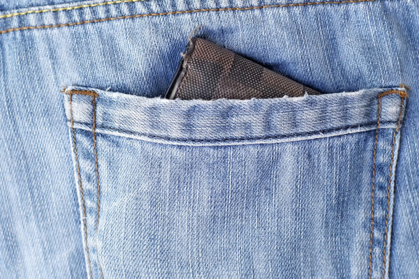 old wallet in back pocket jeans