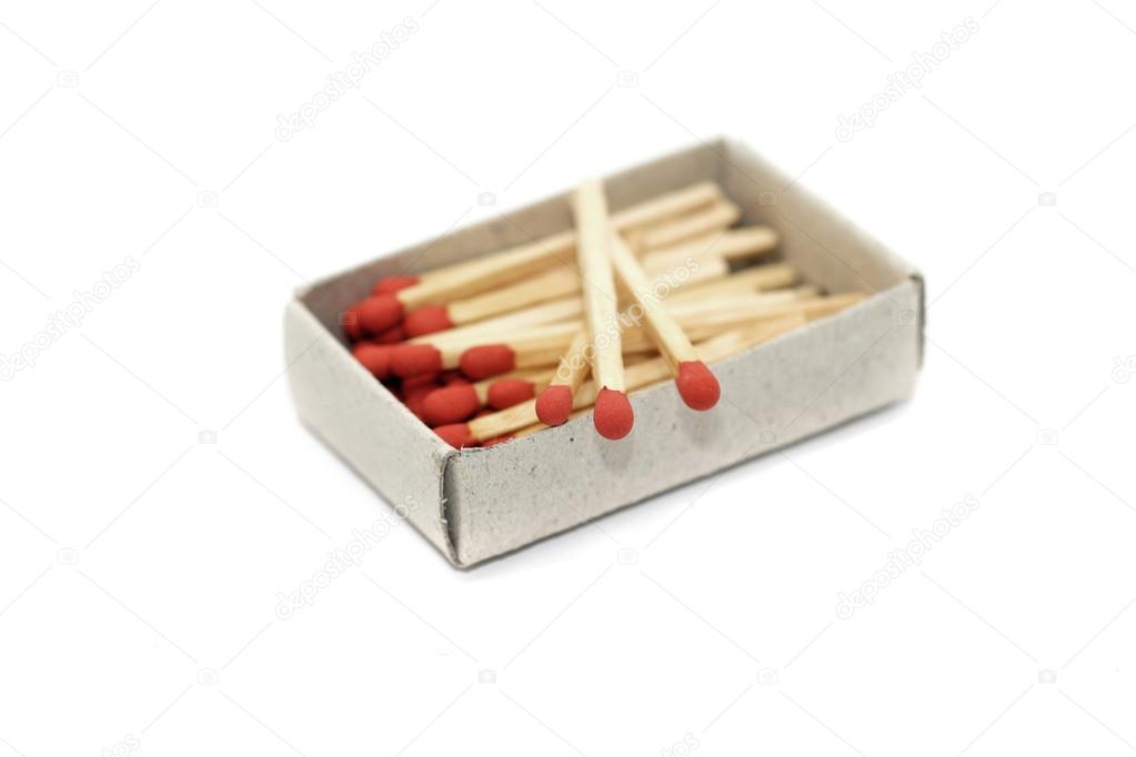 matchstick in matchbox isolated on white