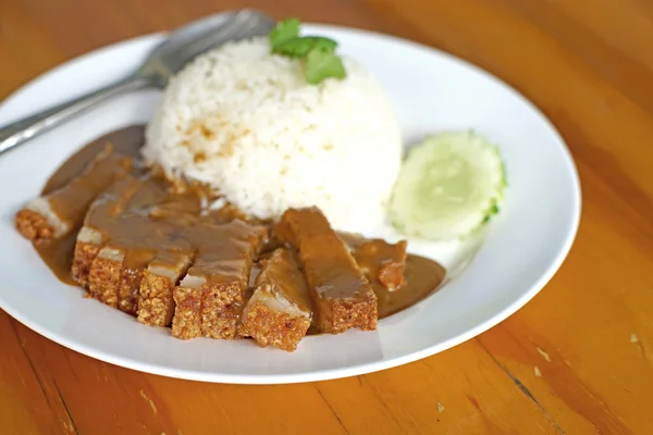 Crispy pork in sauce with rice — Stock Photo, Image