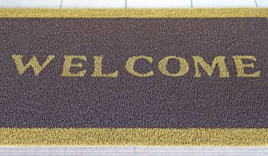 kahverengi paspas hoş geldiniz metni