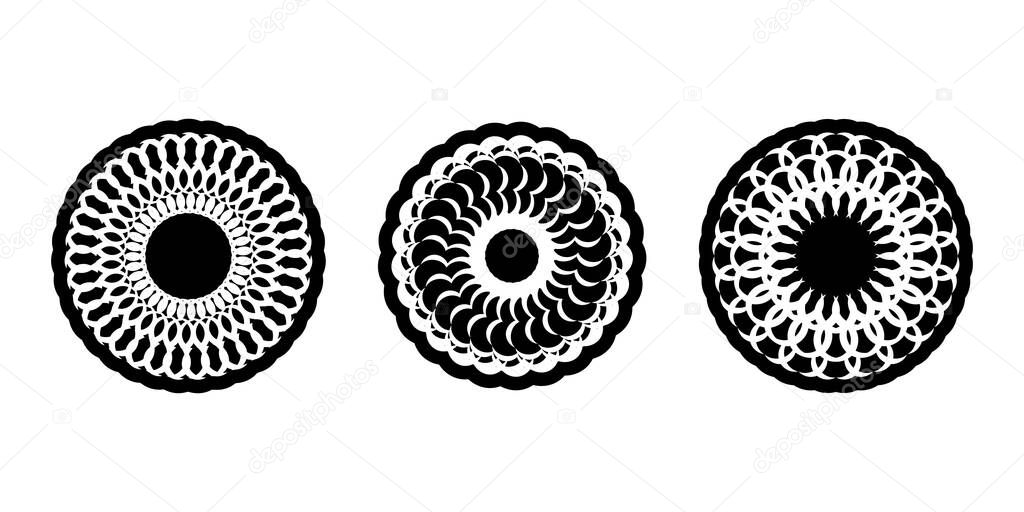 Set of decorative ornaments in the shape of a flower or mandala. Good for logos, tattoos, prints and postcards. Isolated on white background. Vector illustration
