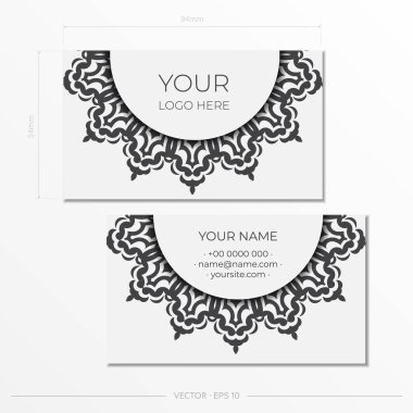 Siyah süslemeli beyaz kartvizitler. Monogram desenli kartvizit tasarımı.
