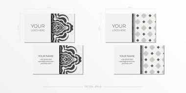 Beyaz renkli vektör kartvizitleri ve muhteşem mandala süslemeleri. Monogram desenli kartvizit tasarımı.