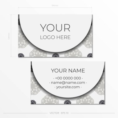 Beyaz kart şablonu ve klasik şablonlar. Monogram süslemeli, baskıya hazır kartvizit tasarımı.