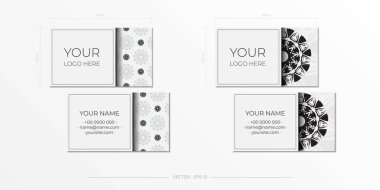 Siyah süslemeli beyaz kartvizit tasarımı. Metinleriniz ve soyut kalıplarınız için yeri olan vektör kartvizitleri.