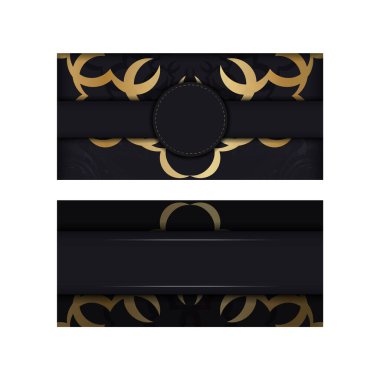 Altın rengi süslemeli siyah renkli broşür