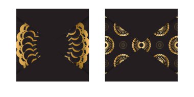 Altın mandala desenli siyah tebrik kartı.