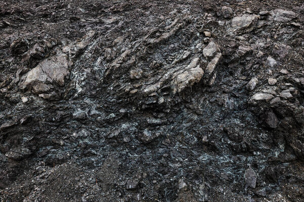 Крупный план темно-серого камня