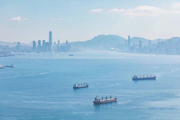 Empty Cargo container ship in Victoria Harbour, Hong Kong. Industrial Transportation