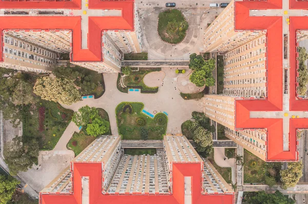Aerial top view of the building exterior of public housing in Hong Kong, real estate in downtown
