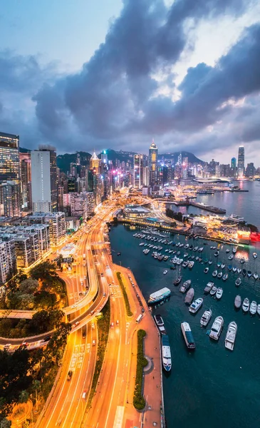 Epic aerial view of night scene of Victoria Harbour, Hong Kong, famous travel destination, metropolis