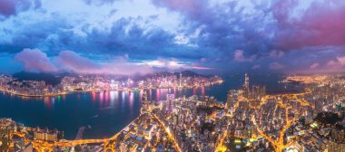 Epic aerial view of cityscape of Hong Kong. Cyberpunk metropolis scene, night, drone view.