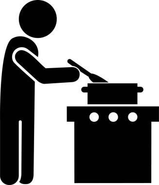 Ocakta yemek pişirirken ayakta duran biri.