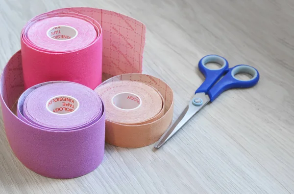 Kinesiological tape rolls. Anti-pain taping for athletes for weight loss, anti-wrinkle — Stock fotografie