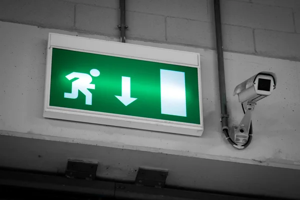 Emergency exit and Security Camera — Stock Photo, Image