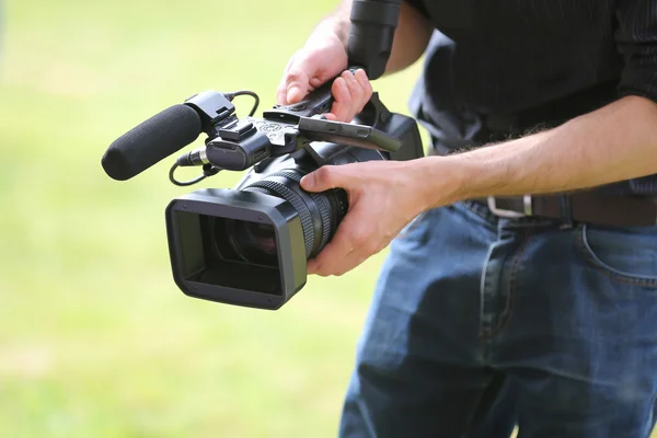 Video camera man with camera — Stock Photo, Image