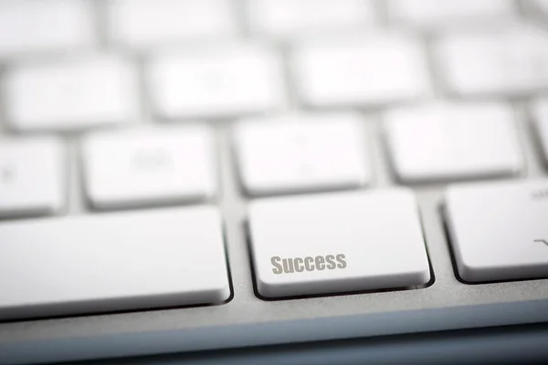 Słowo "Sukces" napisane na klawiaturze — Zdjęcie stockowe