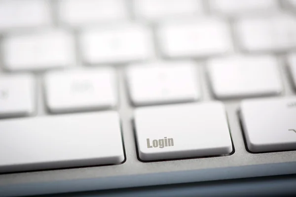 Слово "LOGIN" написано на клавиатуре . — стоковое фото
