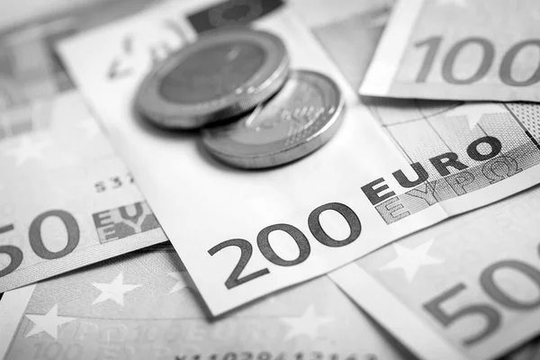 Closeup of euro banknotes and coins — Stock Photo, Image