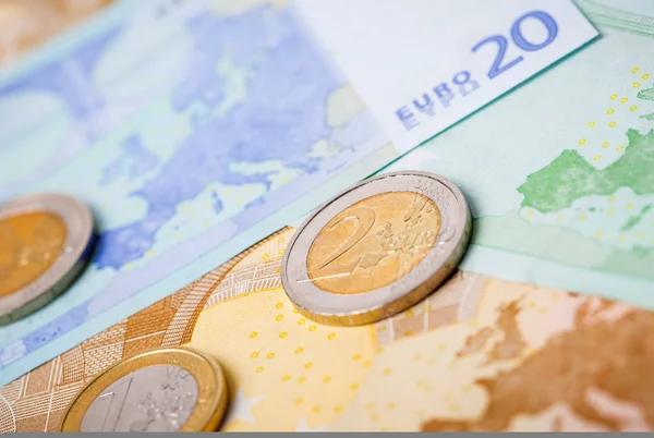 Closeup of euro banknotes and coins — Stock Photo, Image