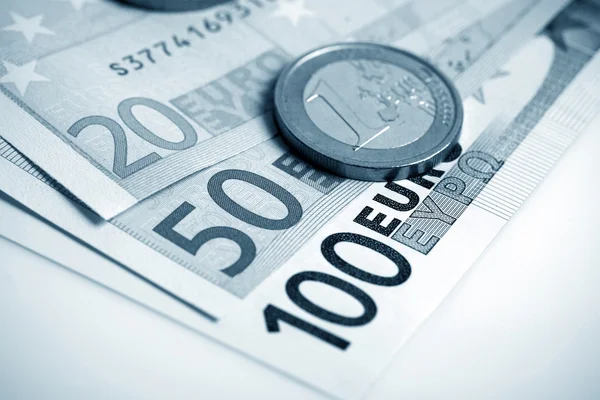 Closeup of euro banknotes and coins — Stock Photo, Image