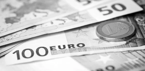 Closeup of euro banknotes and coins — Stock Photo, Image