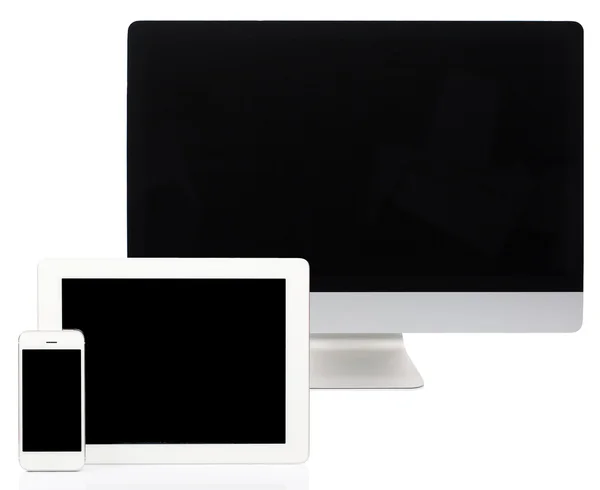 Počítače, tablety a Smartphone na bílém pozadí — Stock fotografie
