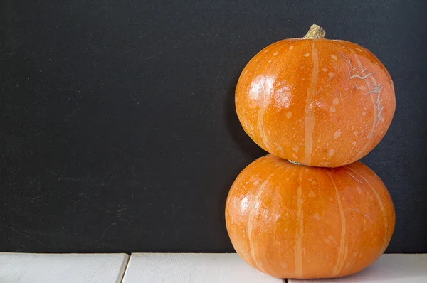 Two orange pumpkins one on another — Stock Photo, Image