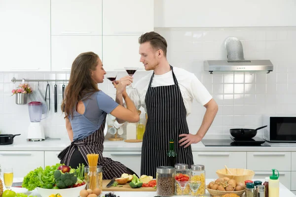 Authentic Picture Young Caucasian Couple Sitting Kitchen Together Drinking Wine — Stock Photo, Image