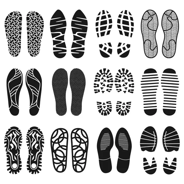 A colecção de uma pegada. Sapatos silhueta ícones preto e branco. Impressão das solas com os diferentes padrões. Vector eps — Vetor de Stock