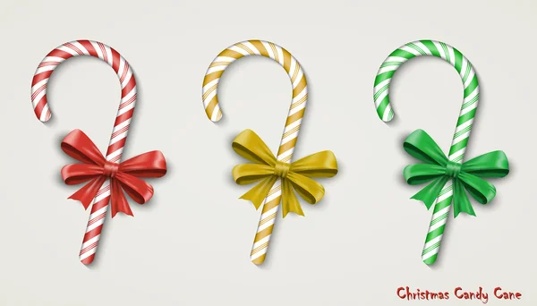 Cane de caramelo de Navidad con arco rojo aislado sobre fondo blanco . — Vector de stock