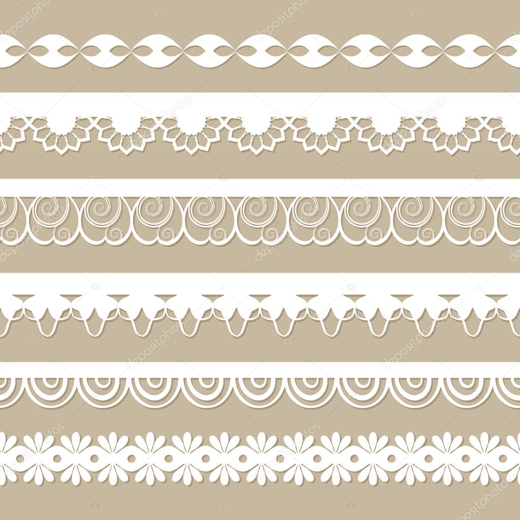 Set of paper laces on the beige background