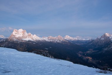 Cadore valley during the sunrise in winter clipart